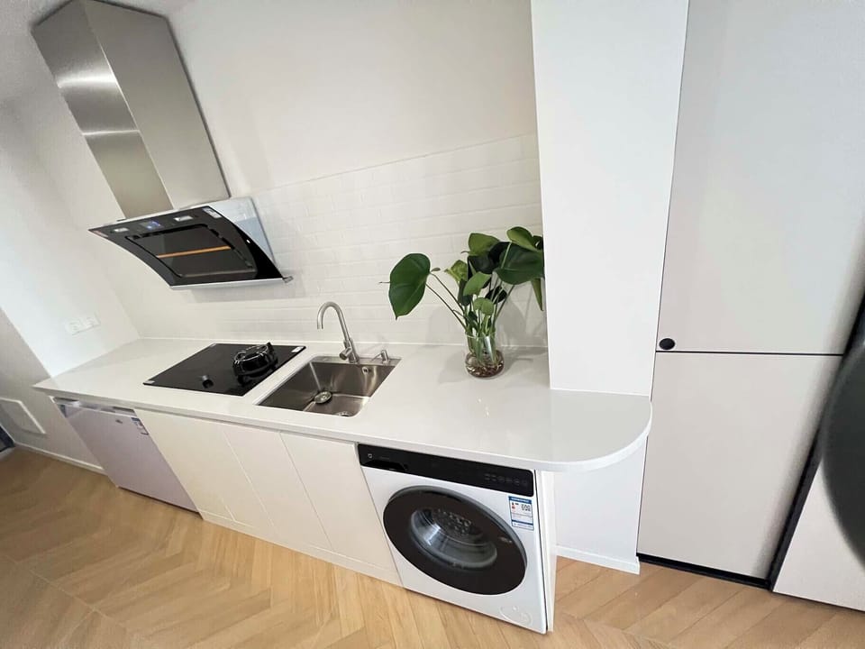Superior Suite | Private kitchen | Cleaning supplies, paper towels
