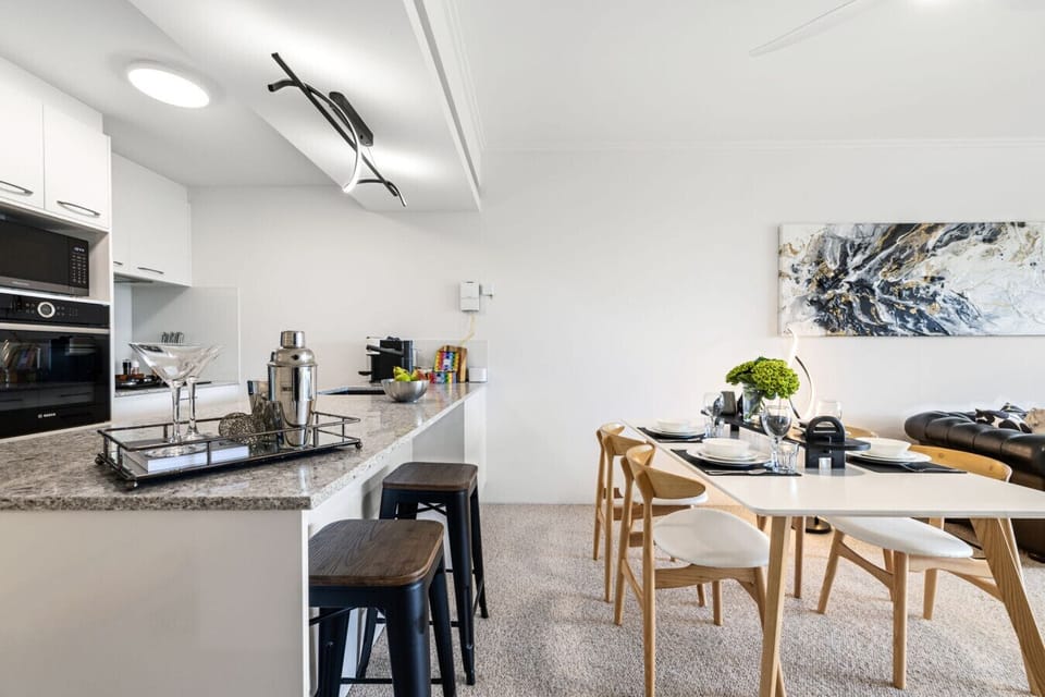 Open plan Kitchen  and dining area with Breakfast bar and coffee machine