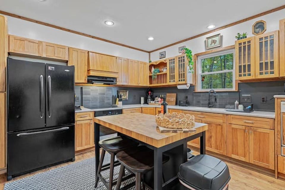 Kitchen is outfitted with an electric range