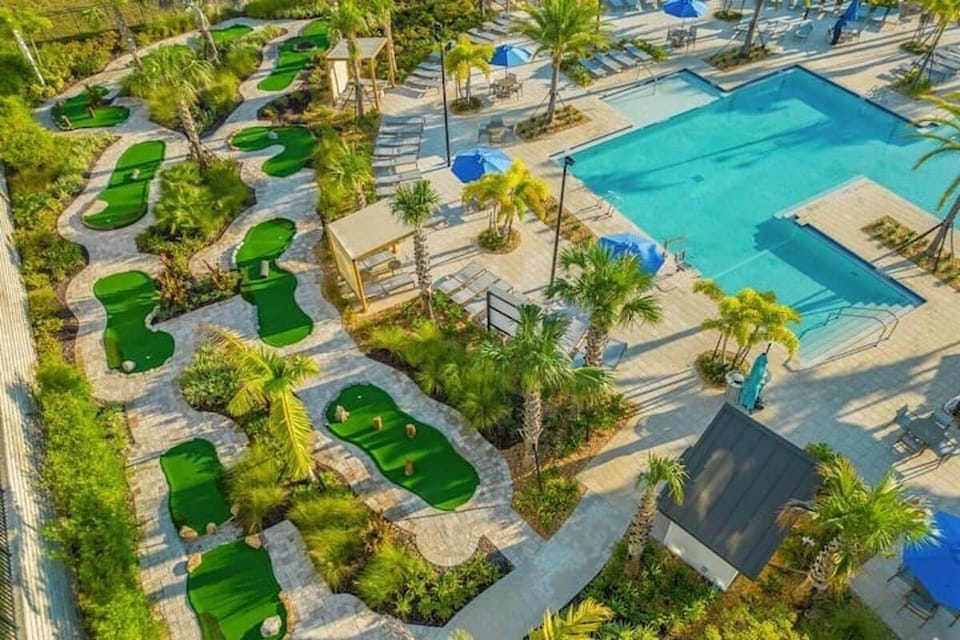 Imagine the perfect start to your morning, challenging your family to a round of mini-golf while bathed in the golden, rising Florida sun.