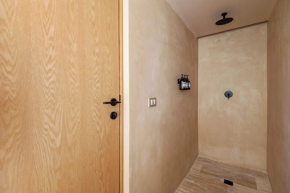 Full bathroom with ceiling shower 
