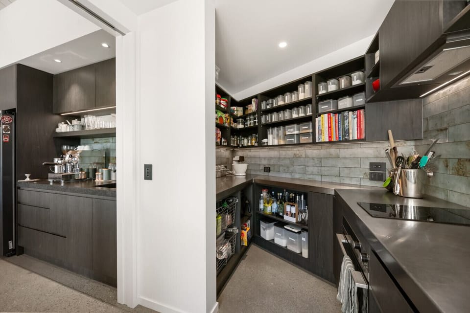 Every culinary need met - a fully stocked pantry, premium coffee setup, and wine fridge ensure you have everything for the perfect stay