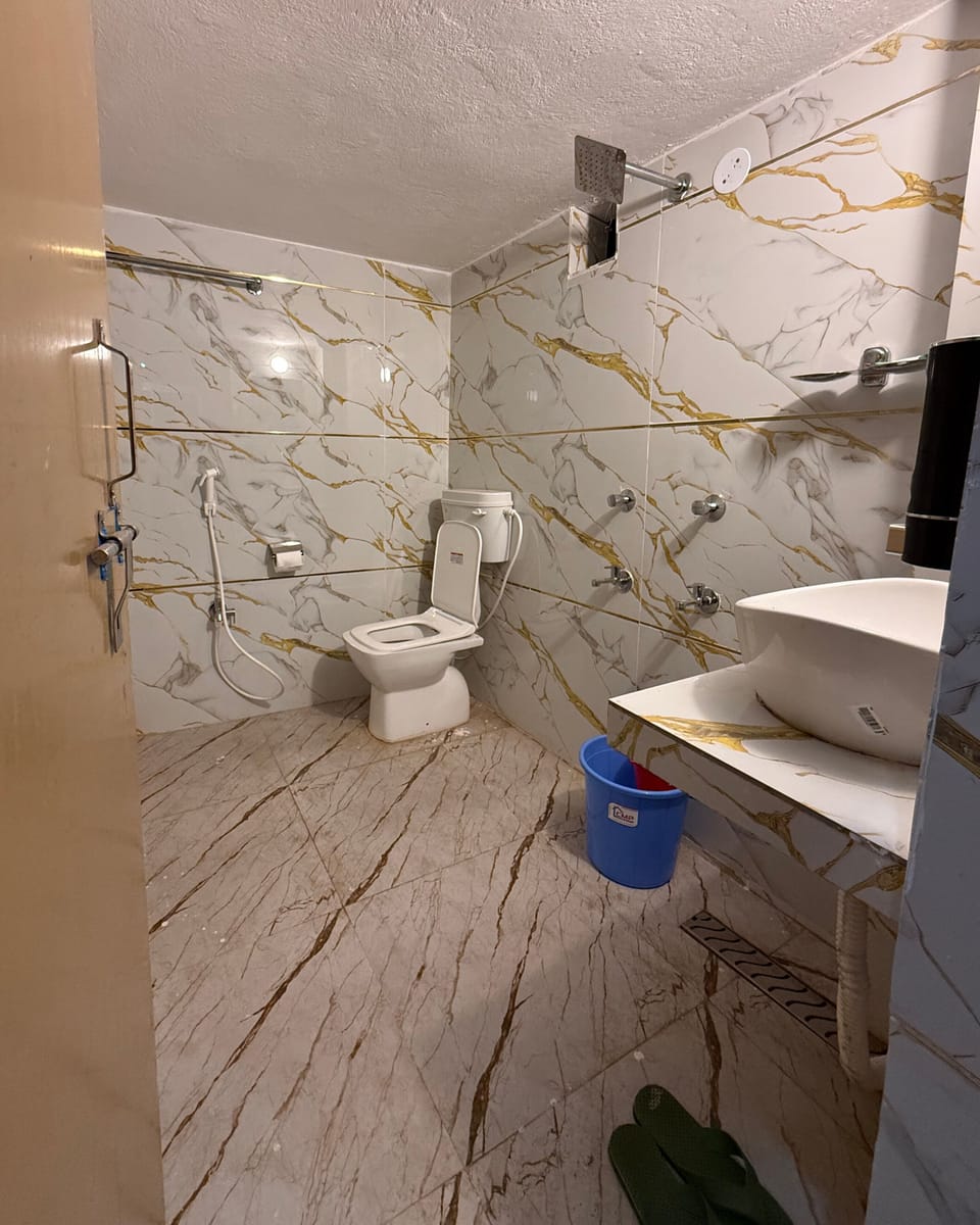 Panoramic Double Room, Mountain View | Bathroom | Shower, slippers, soap, toilet paper