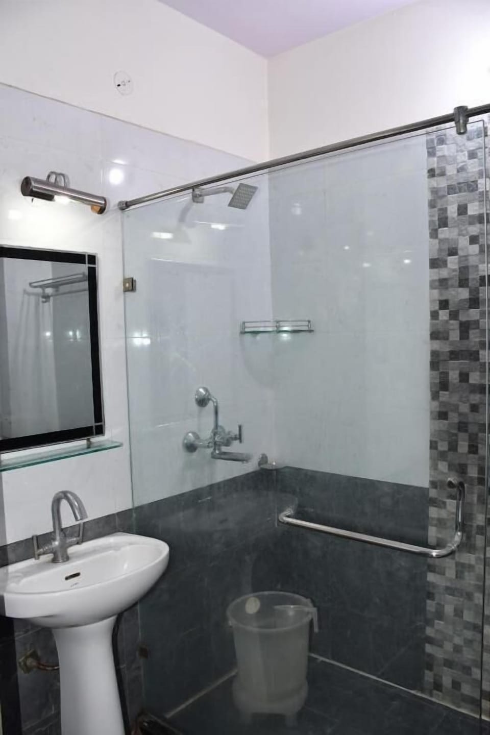 Shower, free toiletries, slippers, towels