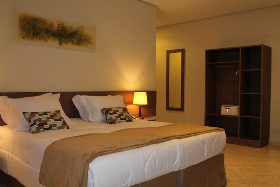 Deluxe Double Room | Minibar, in-room safe, individually furnished, desk