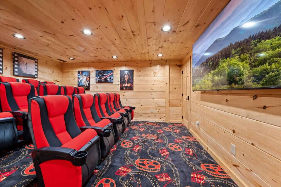 A private theater with plush reclining seats — perfect for movie nights together.