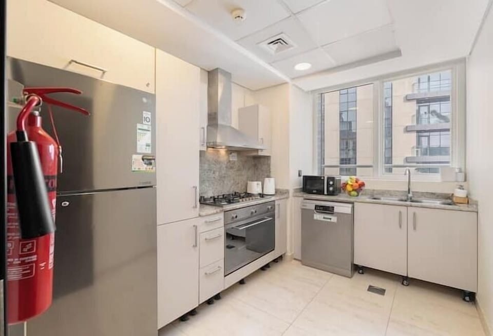 Luxury Apartment, Balcony, City View | Private kitchen | Full-size fridge, microwave, oven, stovetop