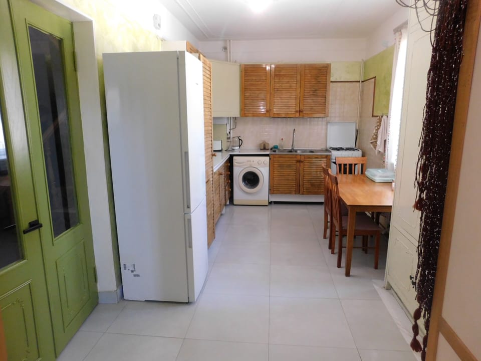 The fully equipped kitchen includes everything needed for a comfortable stay, 