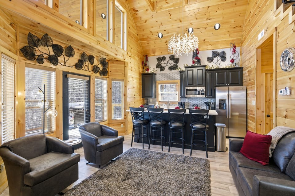 Cabin in the Smokies with a Bowling Alley "Let The Good Times Roll" - Living room, dining area, and kitchen 
