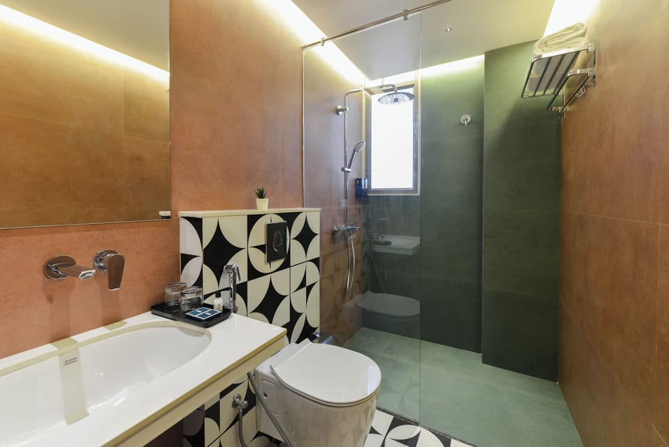 Suite, City View | Bathroom | Shower, hair dryer, slippers, soap
