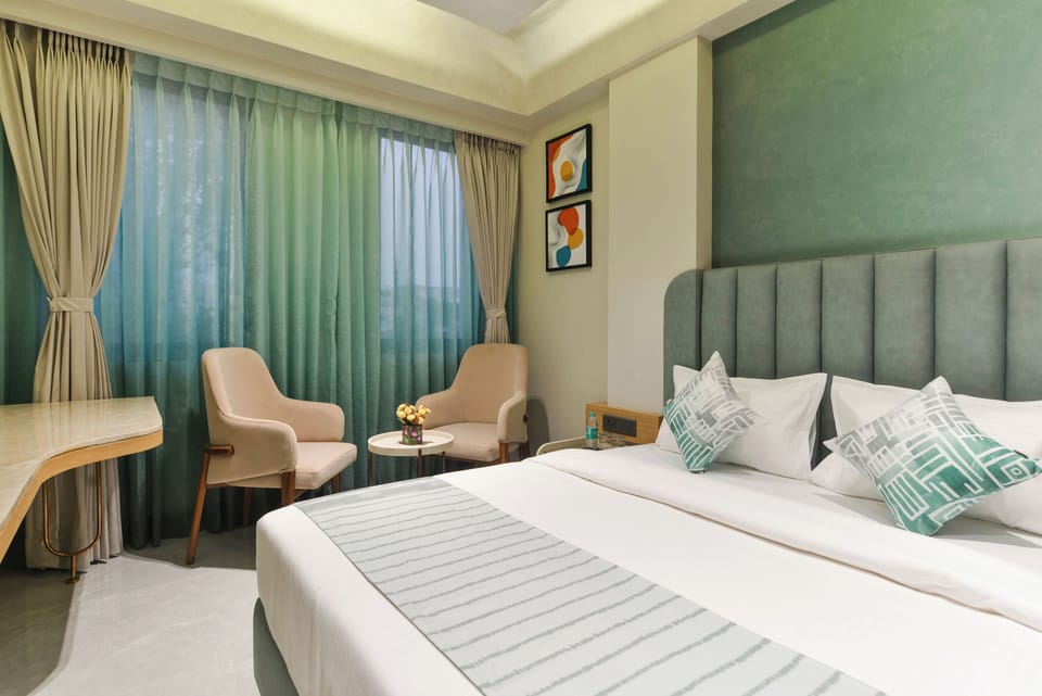 Executive Double Room, City View | In-room safe, desk, laptop workspace, blackout drapes