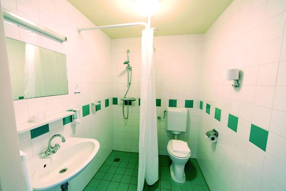 Refresh easily in a spotless bathroom with walk-in shower.