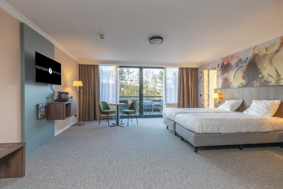 Stretch out in a spacious room with serene forest outlook.