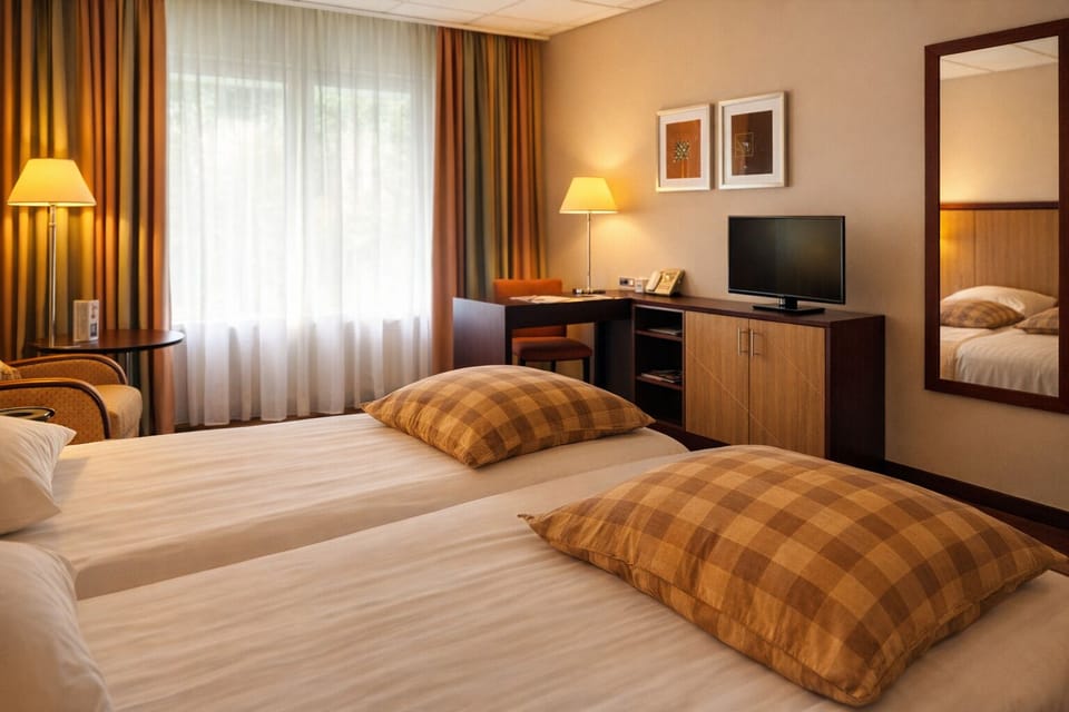 Settle in with a work desk and relaxing in-room TV.