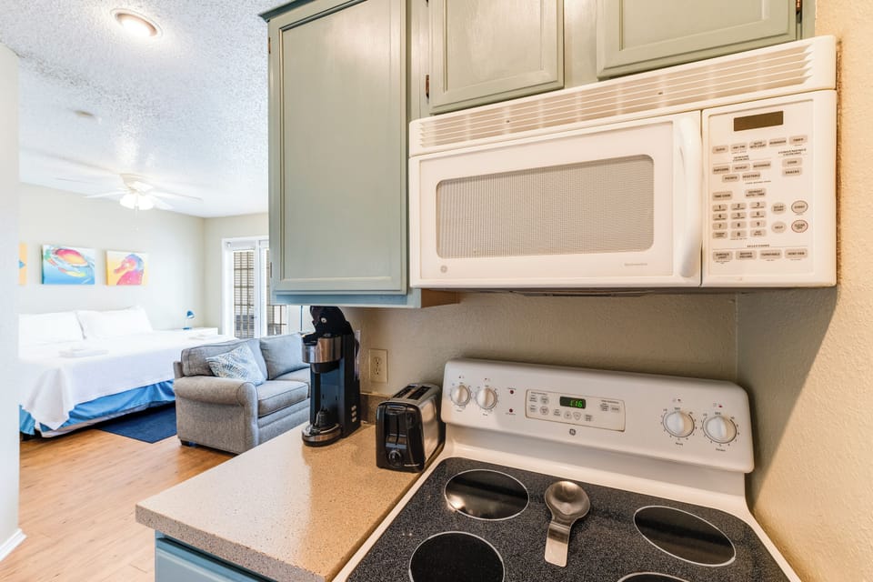 Your fully equipped kitchen lets you whip up meals with modern appliances, while cozy seating awaits just steps away.