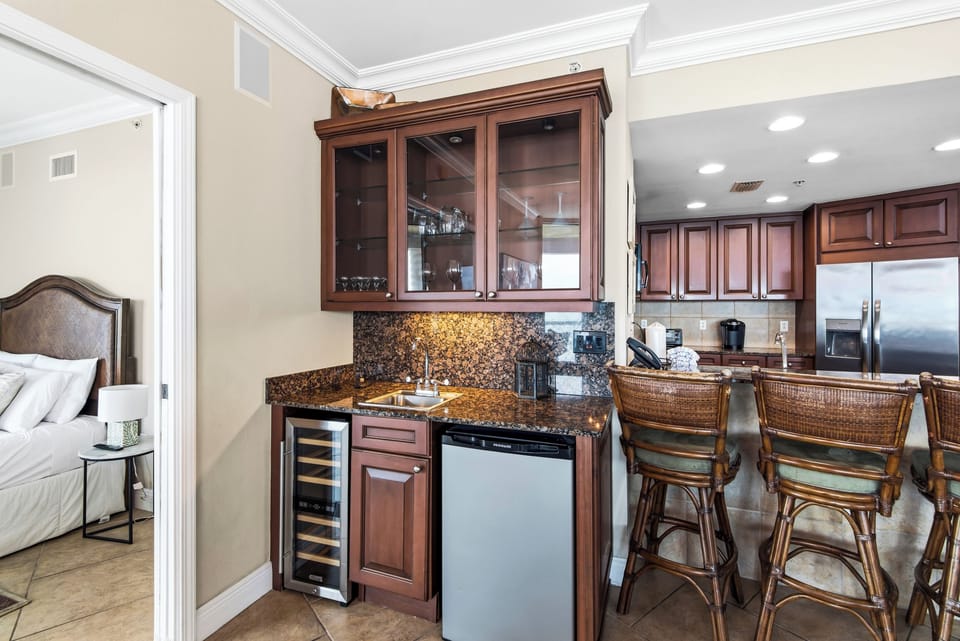Wet bar with ice maker and wine refrigerator