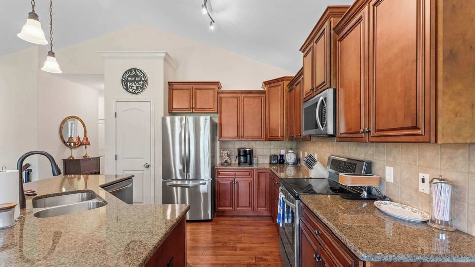 The chic, open kitchen is well equipped for an unforgettable getaway​