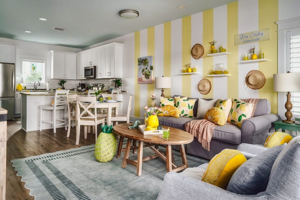 Step into a space where every day feels like a summer afternoon. This vibrant open-concept layout seamlessly connects the chef-ready kitchen to a cozy, lemonade-chic lounge—perfect for entertaining or unwinding in style.