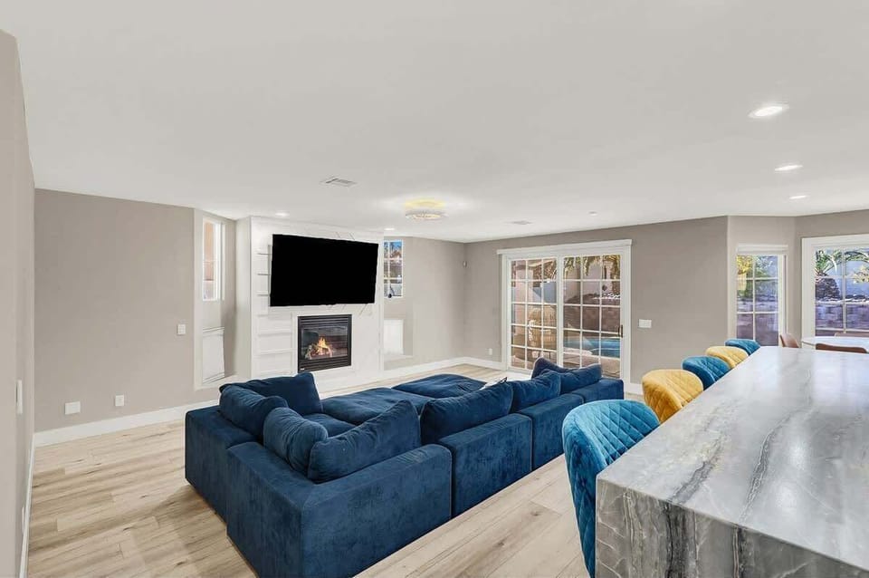 Relax in this cozy living space with plush seating and a 55” Smart TV!