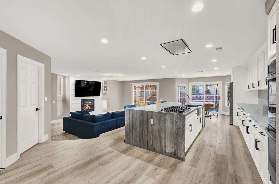 Relax in this cozy living space with plush seating and a 55” Smart TV!