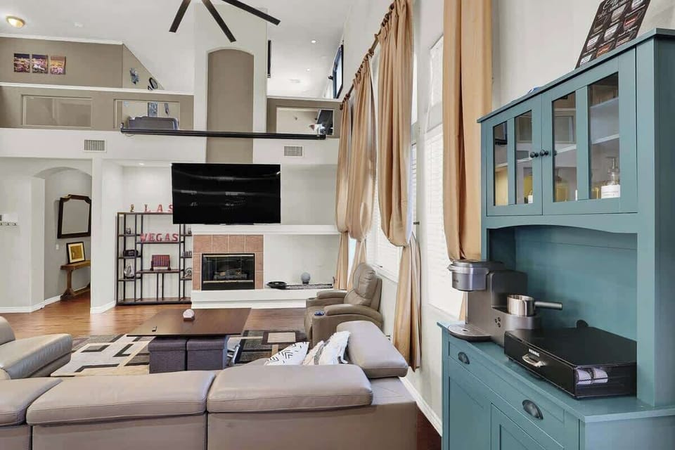 Kick back and relax in the cozy living room with plush seating and a 60” smart TV.