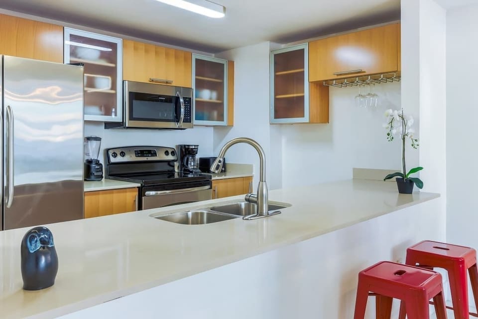 Fully equipped kitchen with complete set of cookware