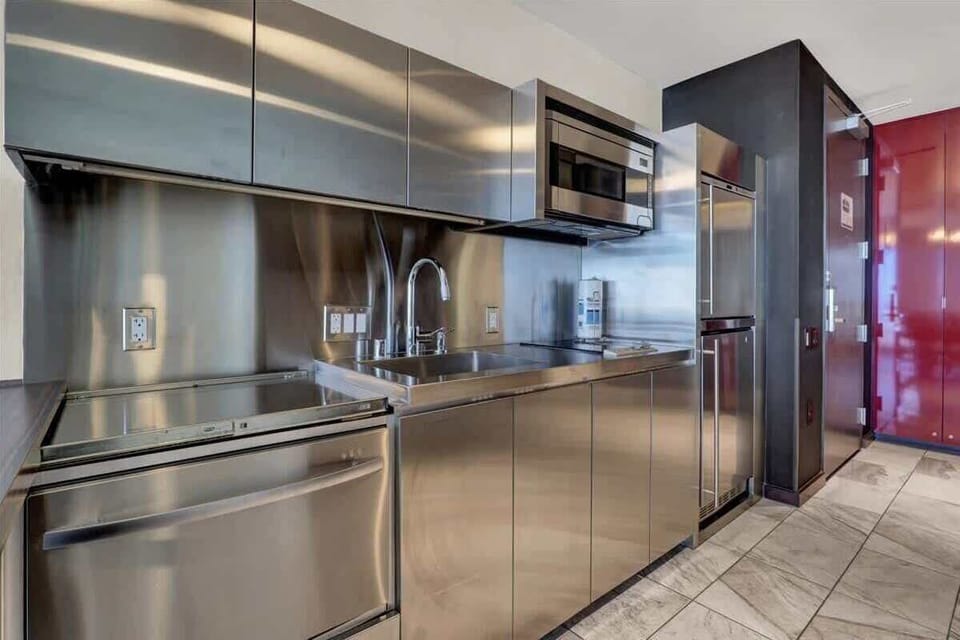 Whip up light meals with ease in the fully equipped kitchenette with modern appliances.