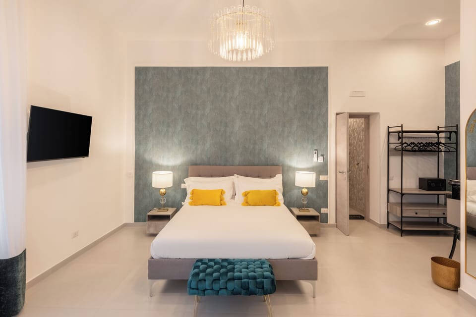 Deluxe Quadruple Room | In-room safe, blackout drapes, soundproofing, free WiFi