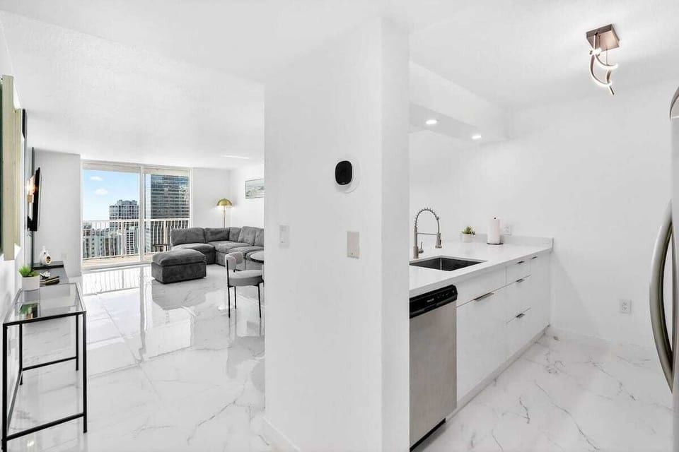 Fully stocked kitchen with modern appliances and everything you need to cook with ease.