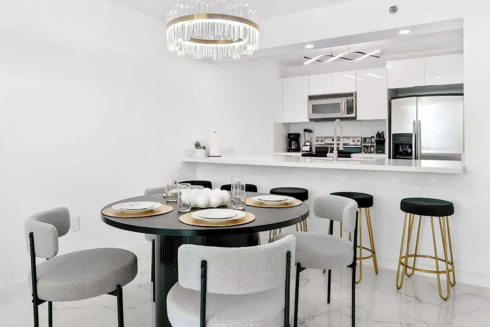 Stylish dining area ideal for meals, work, or relaxing with family and friends.