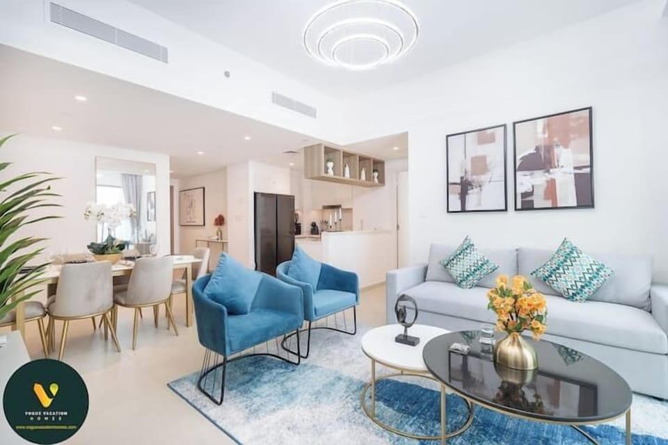 Luxury Apartment, Balcony, City View | Living area | 65-inch Smart TV with cable channels