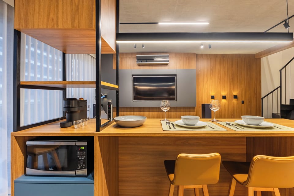 Deluxe Duplex, Kitchen, City View | Living area | 50-inch Smart TV with digital channels, Netflix, streaming services