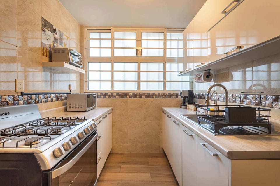 Prepare delicious meals in our fully equipped, modern kitchen.