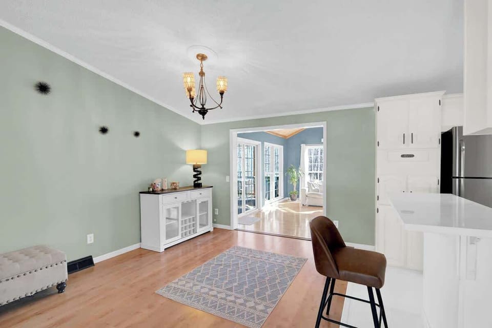 Wine Hutch and Barstool Seating around the Kitchen Bar - be sure to use the Wireless Bluetooth speaker system to the left of the fridge to play your favorite tunes!