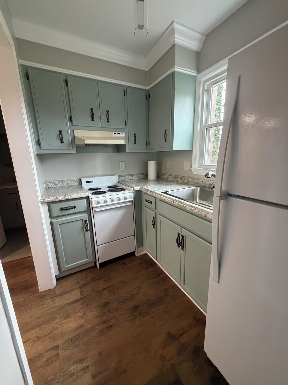 Fully equipped kitchenette in the in-law suite for guest convenience.