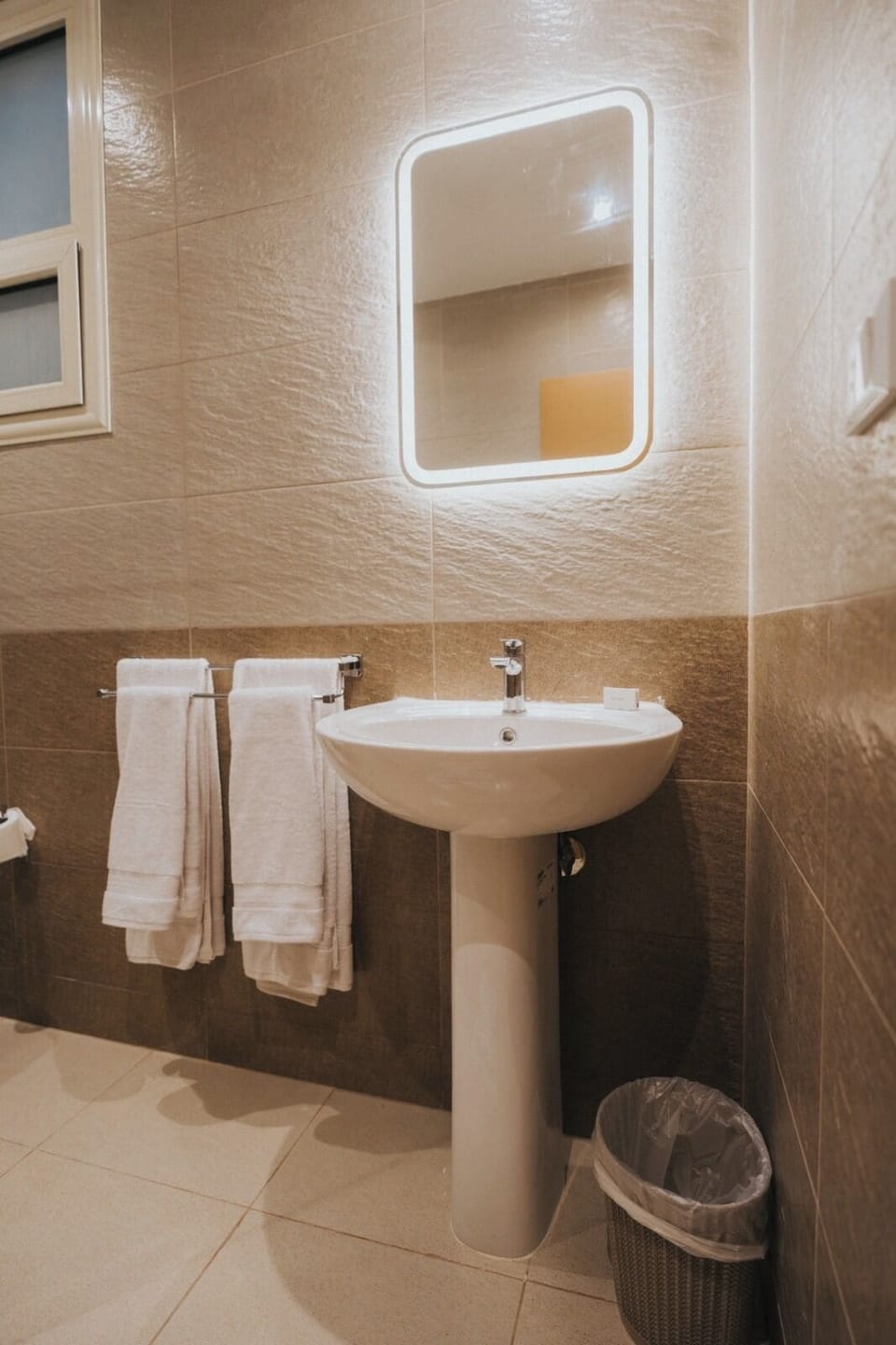 Shower, hair dryer, slippers, towels
