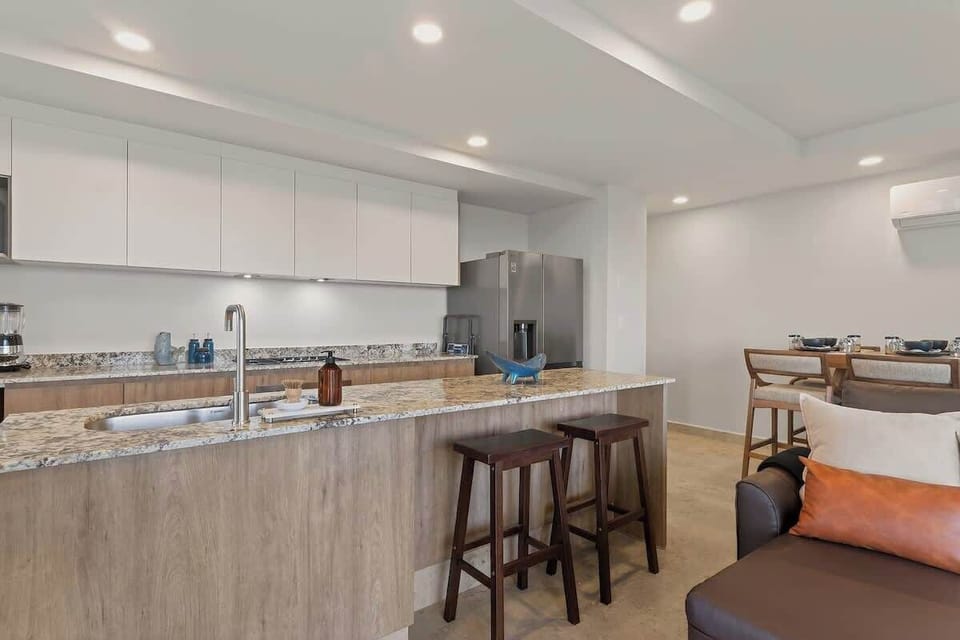 This home has a whole house water filtration system. Feel free to enjoy the filtered water and ice from the fridge. All cooking utensils are provided. 