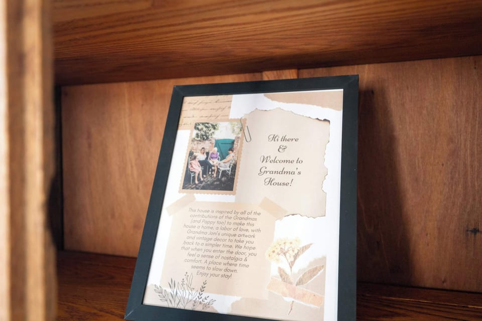 The primary bedroom boasts a plush king-sized bed & a smart TV​