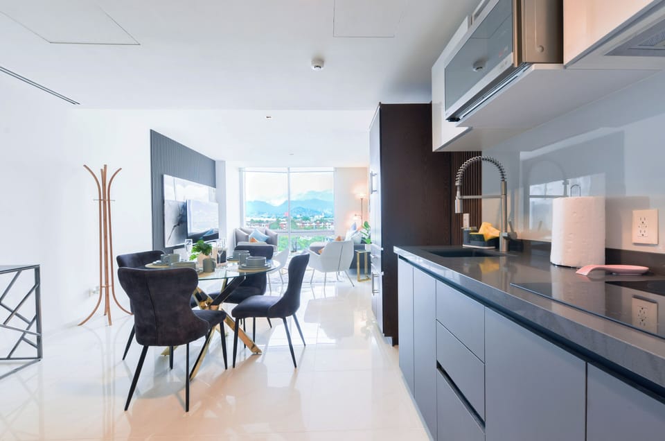 Suite, City View | Private kitchen | Full-size fridge, microwave, stovetop, blender