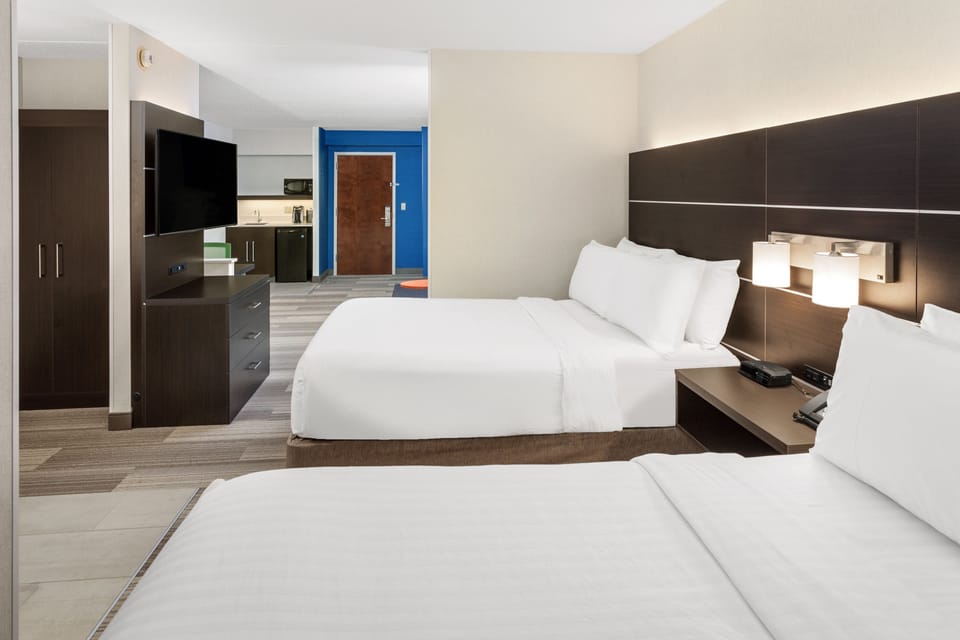Suite, Multiple Beds | In-room safe, desk, iron/ironing board, free cribs/infant beds