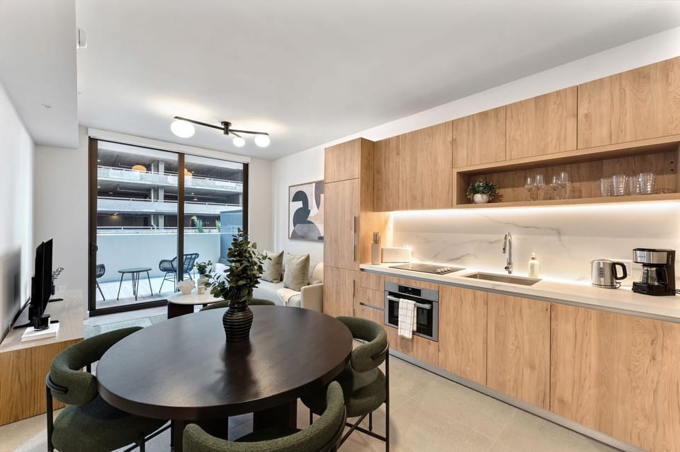 Spacious kitchen and dining area with modern finishes.