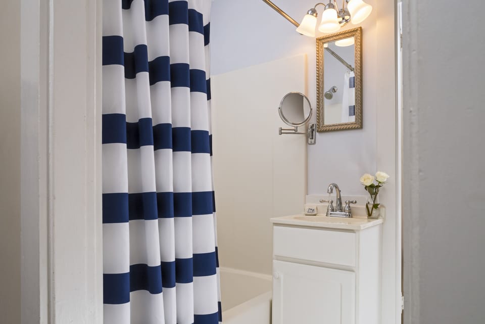 Bass Harbor Suite | Bathroom | Combined shower/tub, designer toiletries, hair dryer, bathrobes