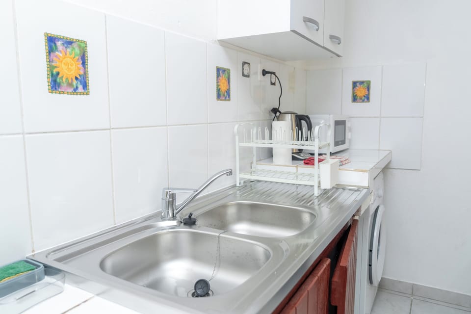 Basic Apartment | Private kitchen | Full-size fridge, microwave, oven, stovetop