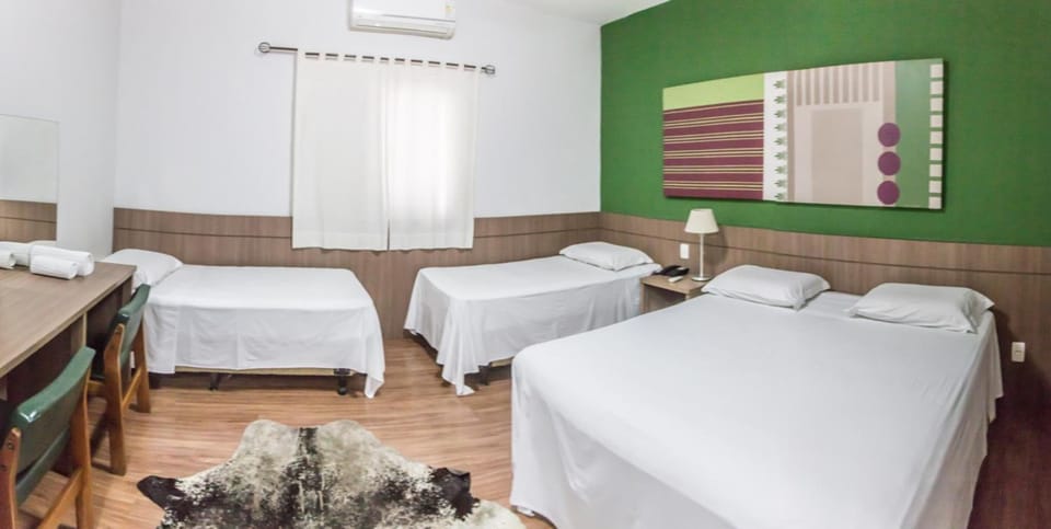 Minibar, desk, WiFi (free), bed sheets