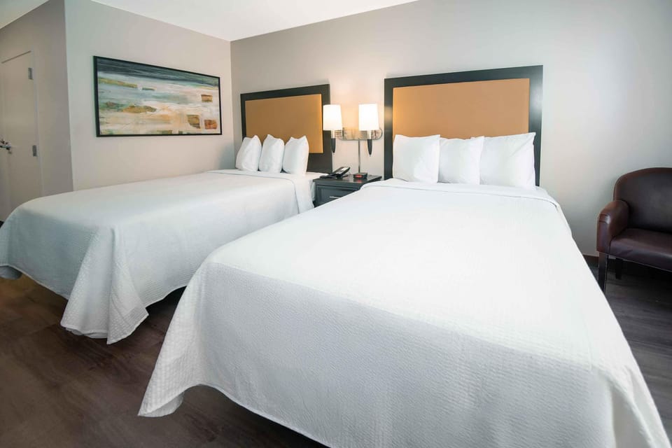 Studio, 2 Queen Beds, Non Smoking | Desk, laptop workspace, iron/ironing board, free WiFi