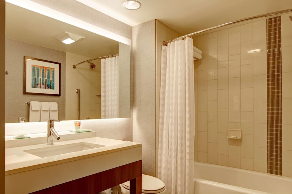 Designer toiletries, hair dryer, towels, soap