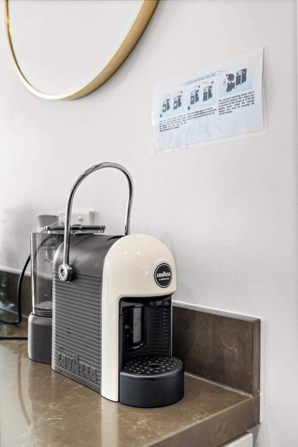 Start your mornings right with a Lavazza coffee machine, kettle, toaster, and thoughtfully stocked kitchen essentials.