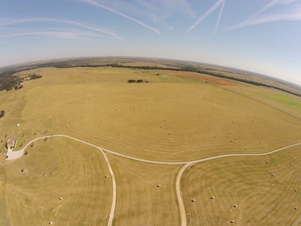 The wide landscape of the Wellborn property.