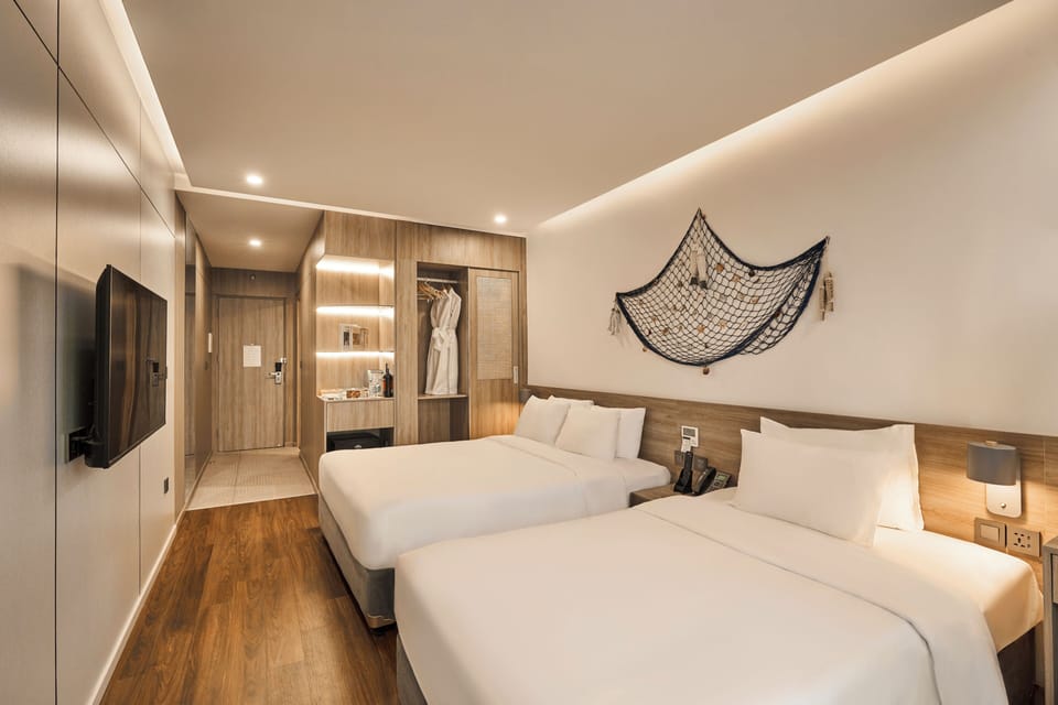 Deluxe Twin Room, Partial Ocean View | Egyptian cotton sheets, premium bedding, down comforters, pillowtop beds