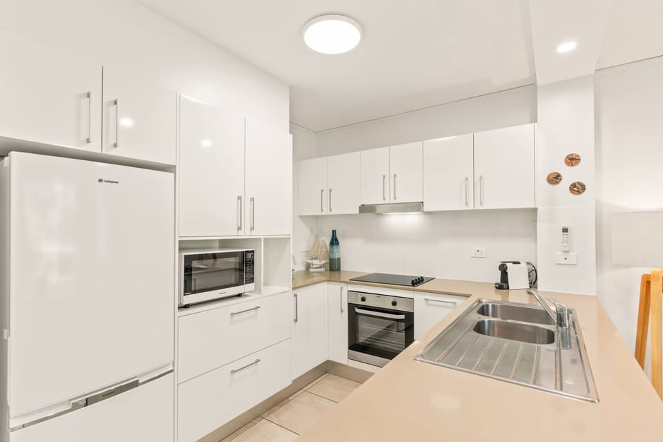 Kitchen with pod coffee machine